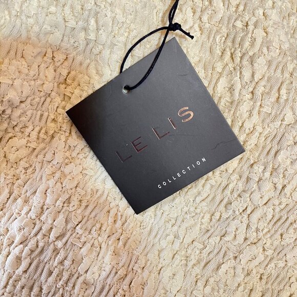 Le Lis Women's Cream Smocked Lace Mini Skirt With Ruffle Hem - Picture 7 of 9